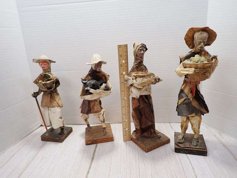 Four Mexican Paper Mache Figurines on Wooden Bases