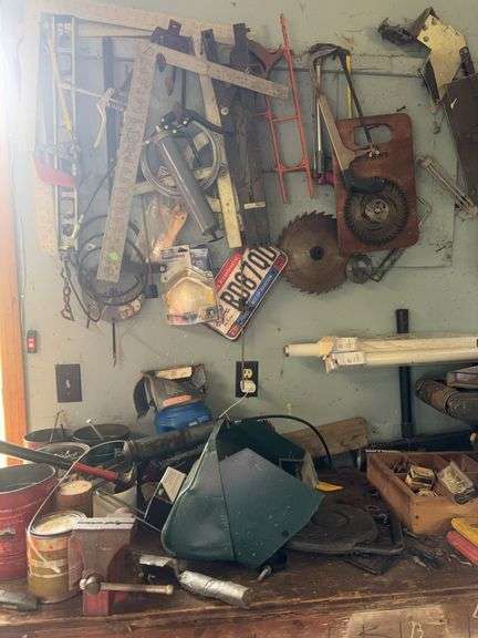 Assorted Tools in Wall and On Workbench