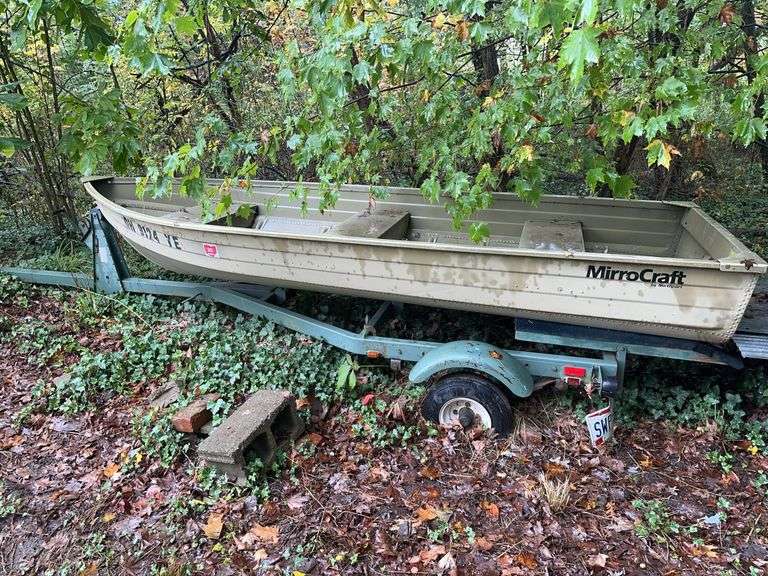 Two Aluminum Boats with One Trailer