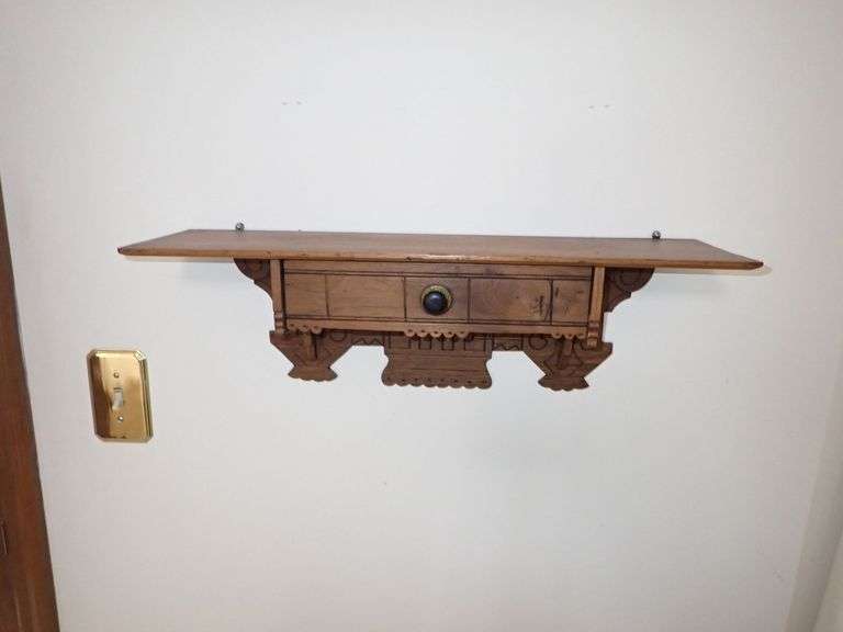 Wall-Mounted Wooden Shelf with Drawer and Decorative Cutouts