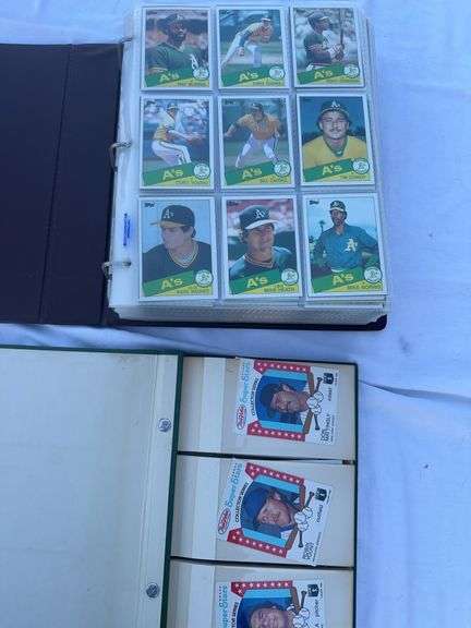 Two binders of cards.  One with 1985 topps and one binder of miscellaneous.