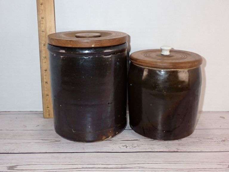 Two Glazed Stoneware Crocks with Wooden Lids