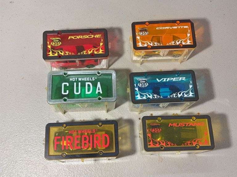 Six Hot Wheels in Plastic Cases