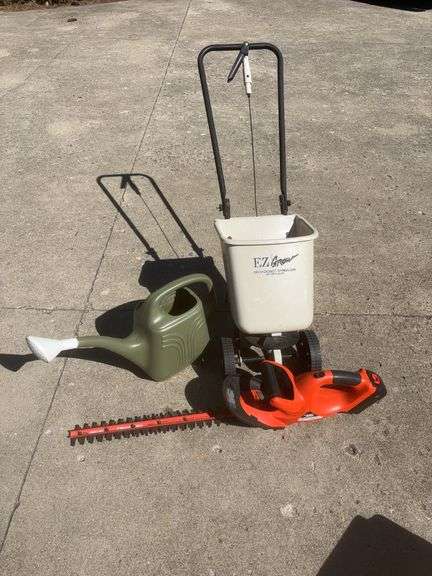 EZ Grow Spreader, Black & Decker Hedge Trimmer, watering jug