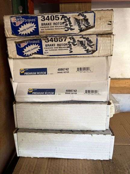 EMPTY BULLET BOXES, GUN BOOKS, AND BRAKE ROTORS. - Auction Ohio