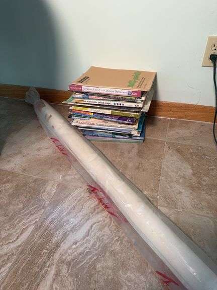 Roll of Canvas and Art Books