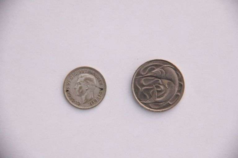 1950 Australia sixpence with silver and a $.20 piece from Singapore