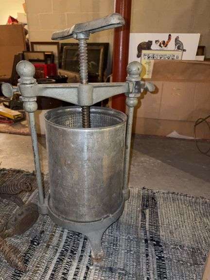 Antique cast iron fruit and lard press
