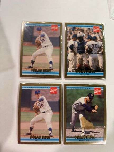 Four packs of Donruss Coca-Cola 1992 cards.