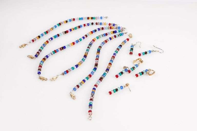 Group of Multi-colored Sparkly Bracelets and Matching Earrings