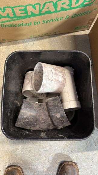 Assorted PVC Pipe Fittings in Black Bin