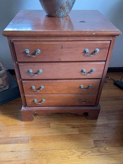 Wooden Four-Drawer Chest With Brass Handles