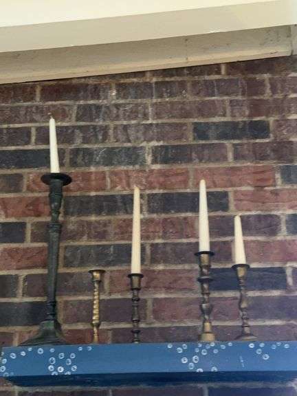 Brass and Bronze Candlesticks with Tapered Candles