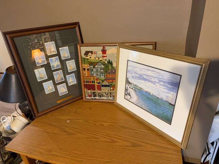 Three Framed Artworks Including Needlepoint, Print by Claude Monet, and Tobacco Card Sailboat Displa