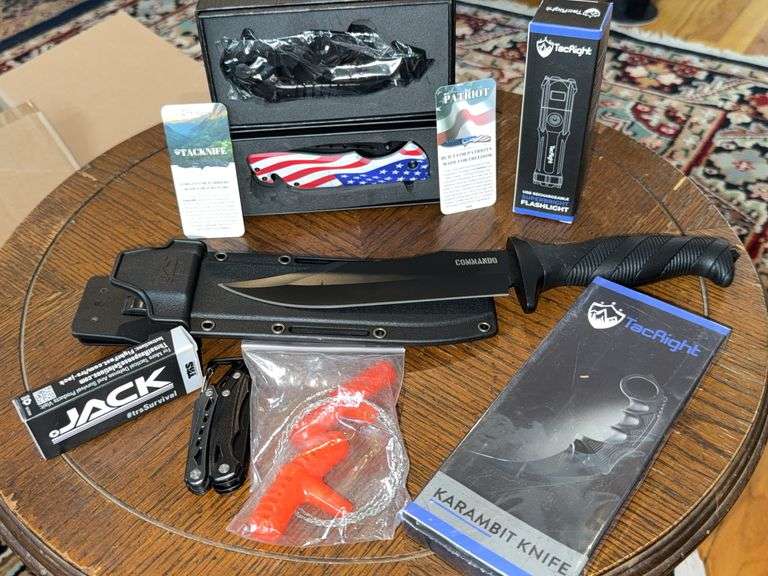 Tac-Right Survival Gear Including Knives, Flashlight, and Wire Saw