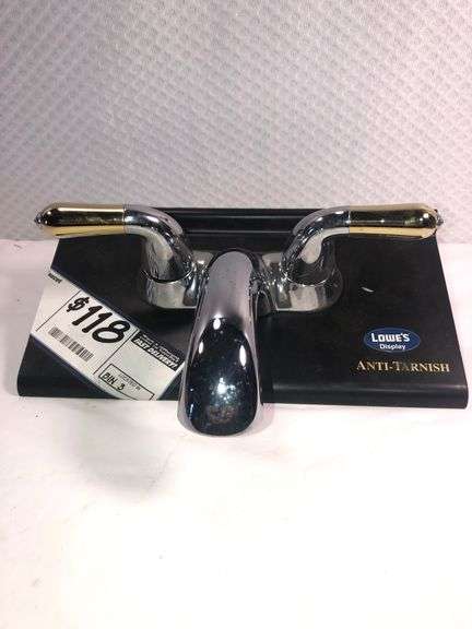 Delta Chrome and Polished Brass Faucet with Lever Handles