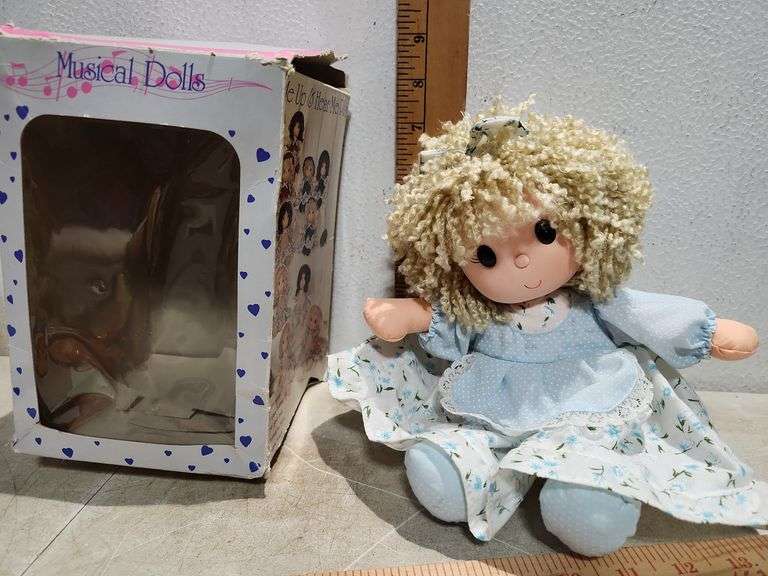 Wind Me Up And Hear Me Play Musical Doll With Rotating Head