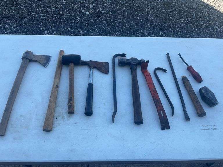 Hand Tools Including Axes, Hammers, Pry Bars, and Screwdriver