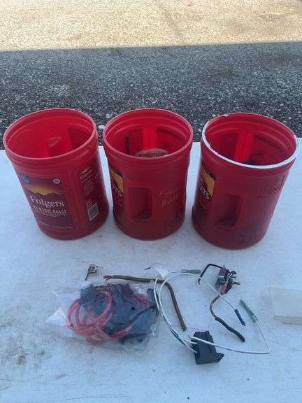 Three Plastic Coffee Canisters with Electrical Components and Wire Connectors