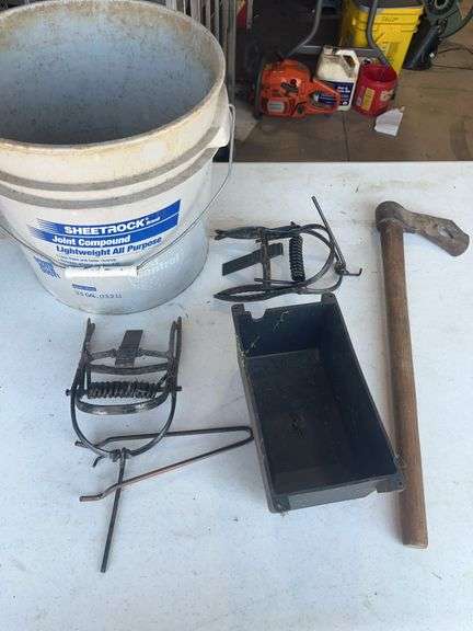 Tools and Materials Including Joint Compound, Traps, and Hand Tools