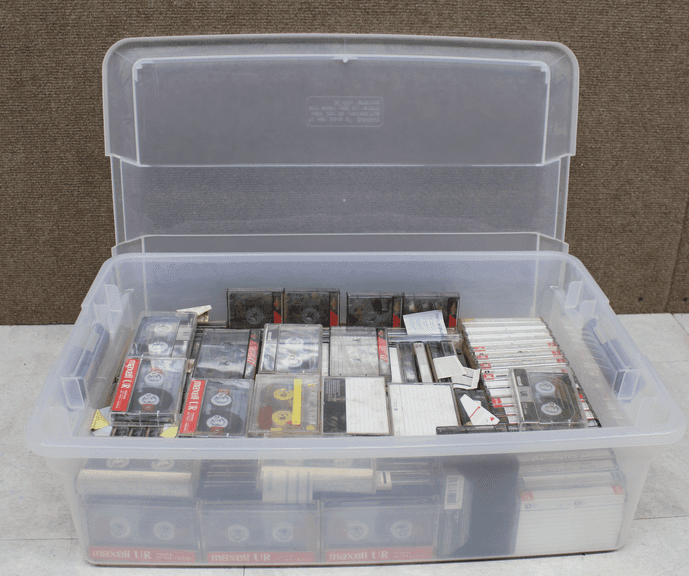 Plastic Storage Bin Containing Mixed Audio Cassette Tapes