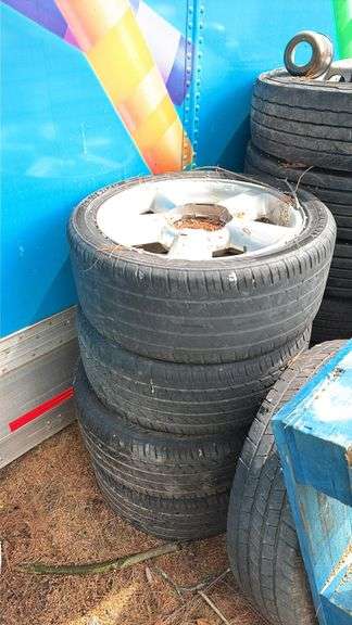 Set of 4 Used Tires Chevy Wheels