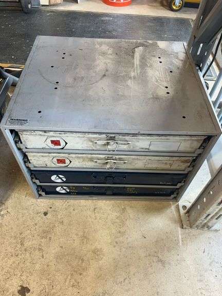 Metal Storage Cabinet with Four Drawers Containing Bolts, Nuts, and Washers