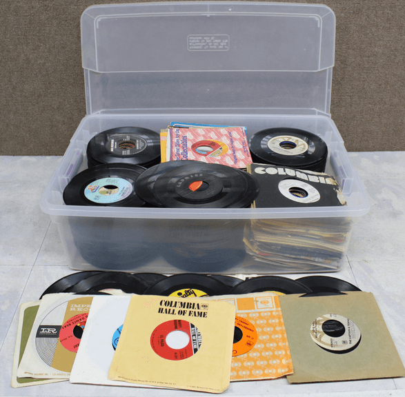 45 RPM Vinyl Records With Sleeves in Plastic Storage Bin