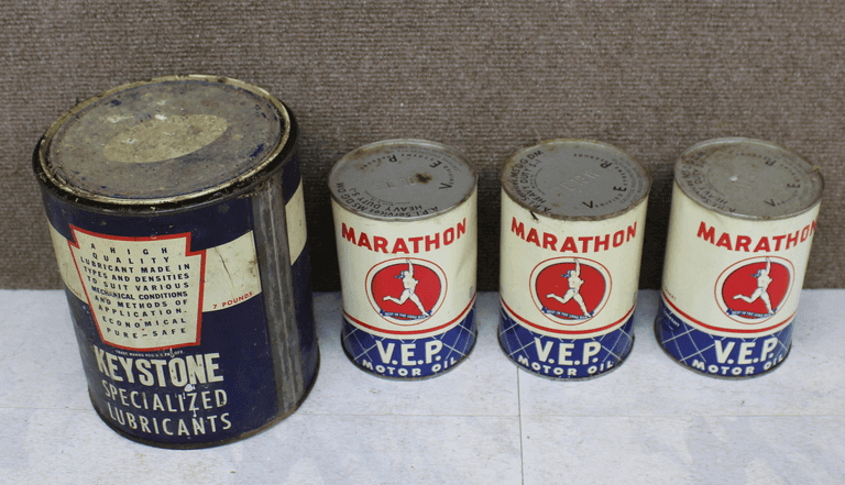 Four Full Vintage Oil Cans: Keystone Lubricants and Marathon V.E.P. Motor Oil