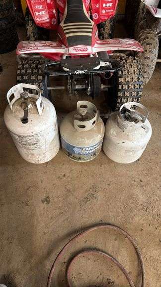 Three Propane Tanks