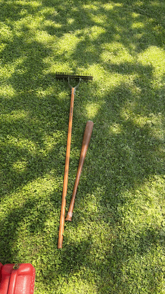 Garden Rake and Baseball Bat