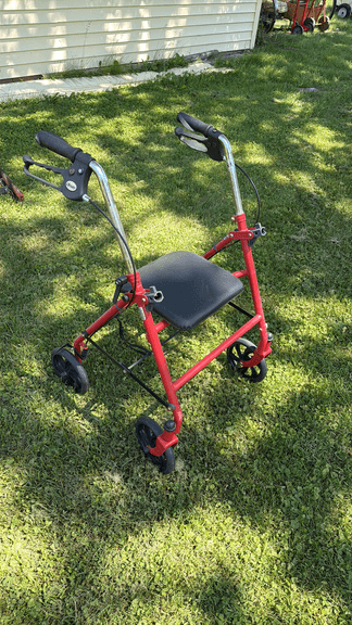 Red Folding Walker with Seat