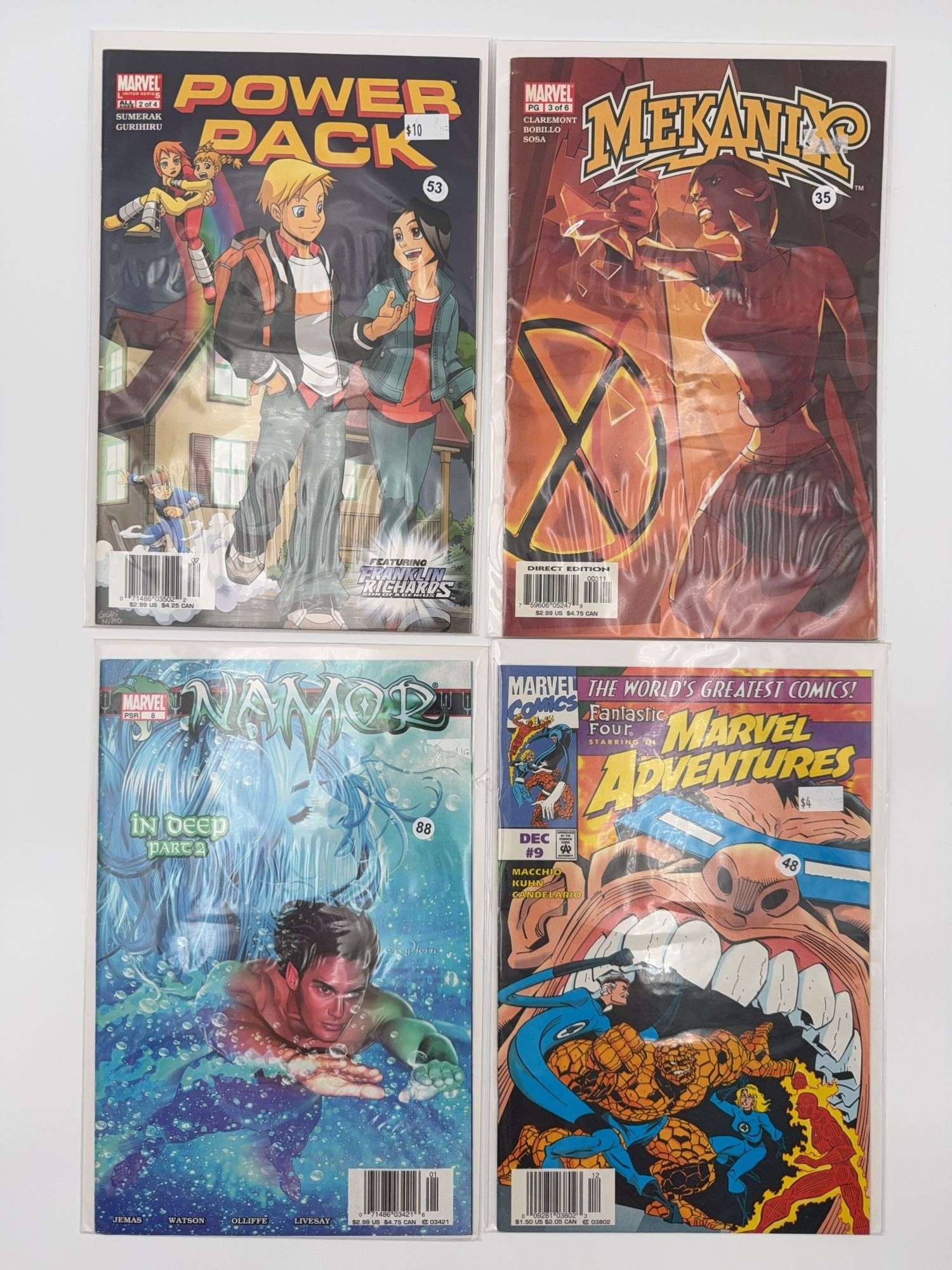 Marvel Comics 4 Pack Mekanix, Fantastic Four & More - Auction Ohio