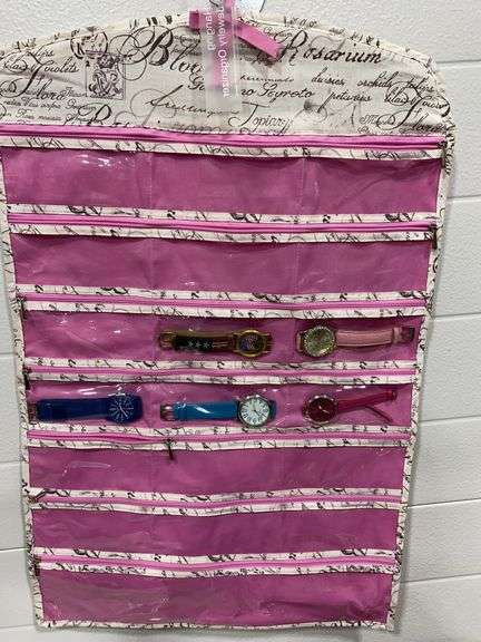 assorted wristwatches with a hanging organizer.