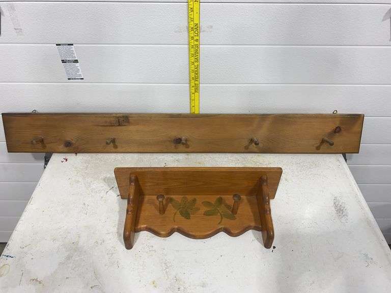 wooden wall shelf / display rack.