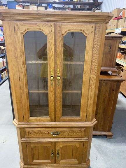 Large freestanding wooden corner  hutch / china cabinet.