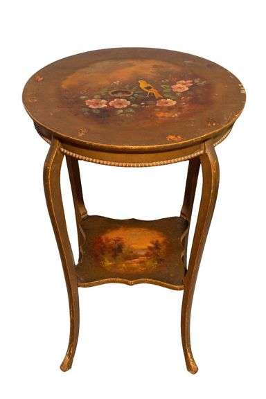ROUND TABLE WITH PAINTED TOP AND GLASS COVER.