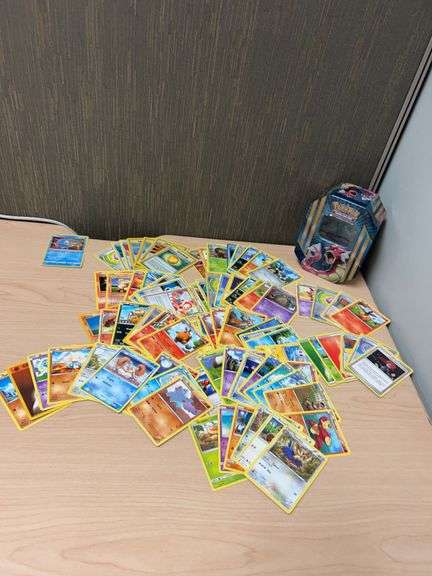 Pokémon Trading Card Game Collection With Gyarados Tin and Over 70 Loose Cards (Mixed Sets)