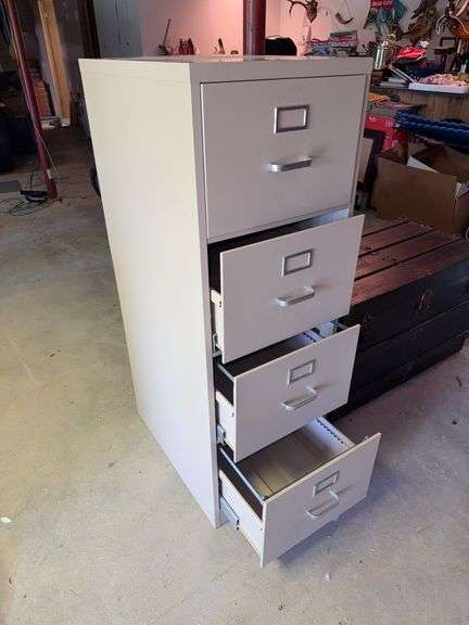 Metal four drawer filing cabinet