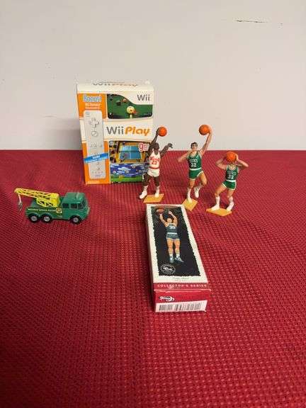 Basketball Players , Wii Remote and toy tow truck