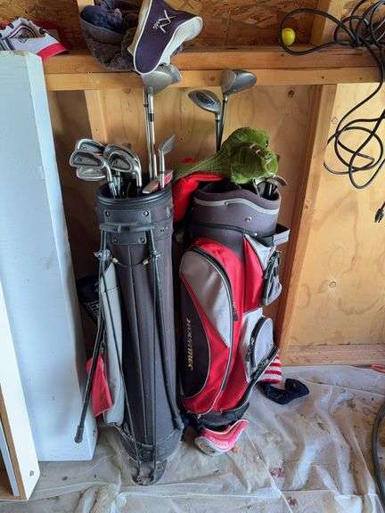 Golf Bags with Assorted Golf Clubs