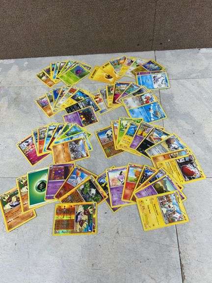 Pokémon Trading Card Game Collection With Assorted Types, Energies, and Holo Cards, Approx. 50+ Card