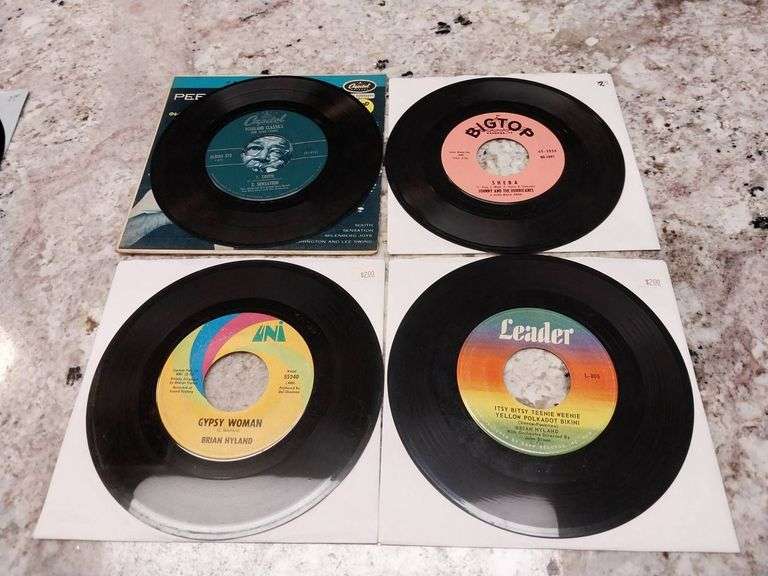 4 Assorted 7-Inch Vinyl 45 RPM Records Featuring Brian Hyland, Johnny and the Hurricanes, and Pee We