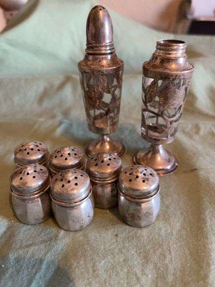 Sterling Salt and Pepper Shakers  Some Glass included  Approximately 2.5 oz