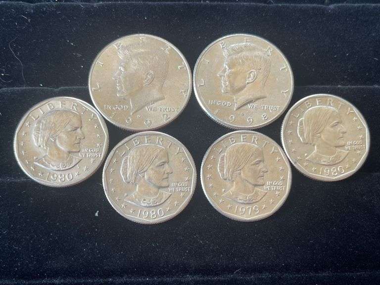 Two Kennedy Half Dollars with Four Susan B. Anthony