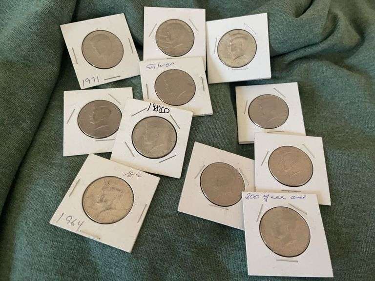 Eleven Kennedy Half Dollars