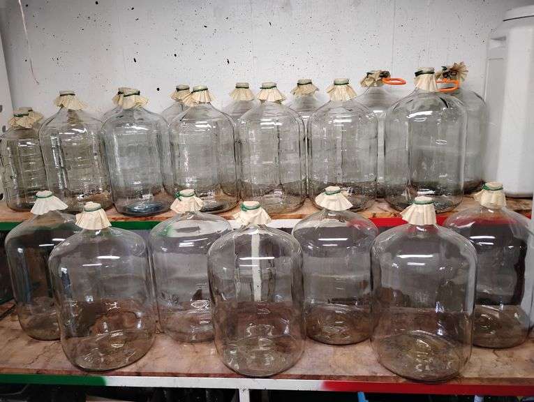 Twenty Three Various Sized Glass Carboys with Fermentation Airlocks with Stoppers