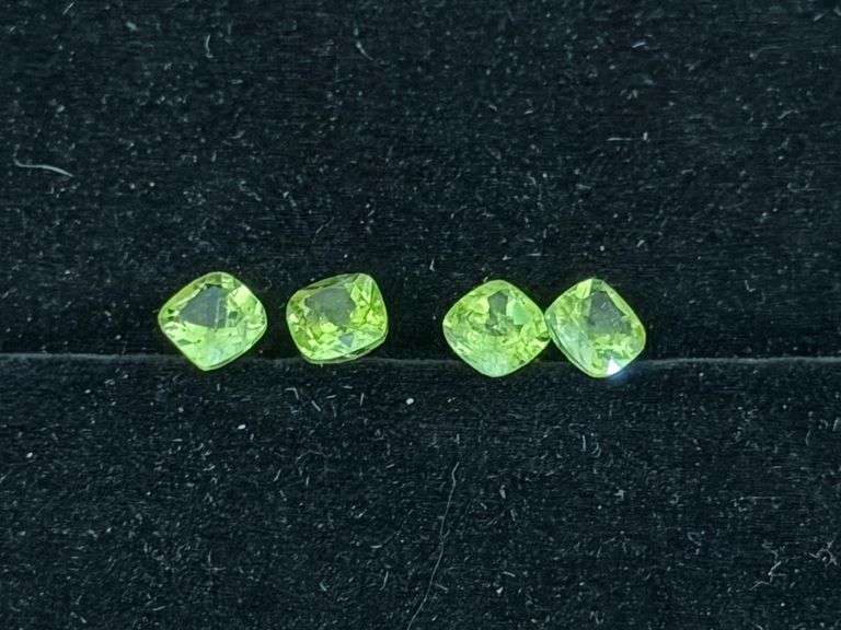 Four Peridot Gemstones