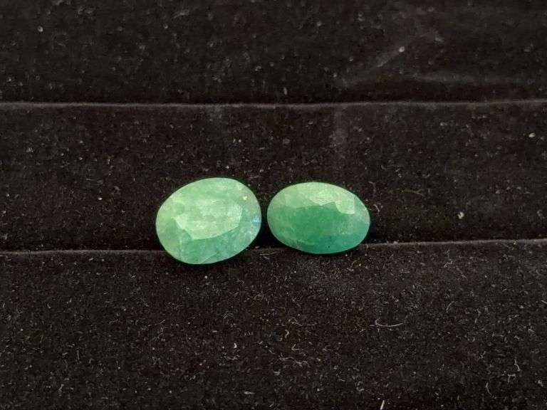 Two Oval Cut Emeralds