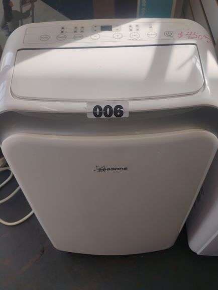 Seasons Portable Air Conditioner. A portable air conditioning unit designed for cooling, and potentially heating, individual rooms with various settings and a digital control panel. - $450 - 600